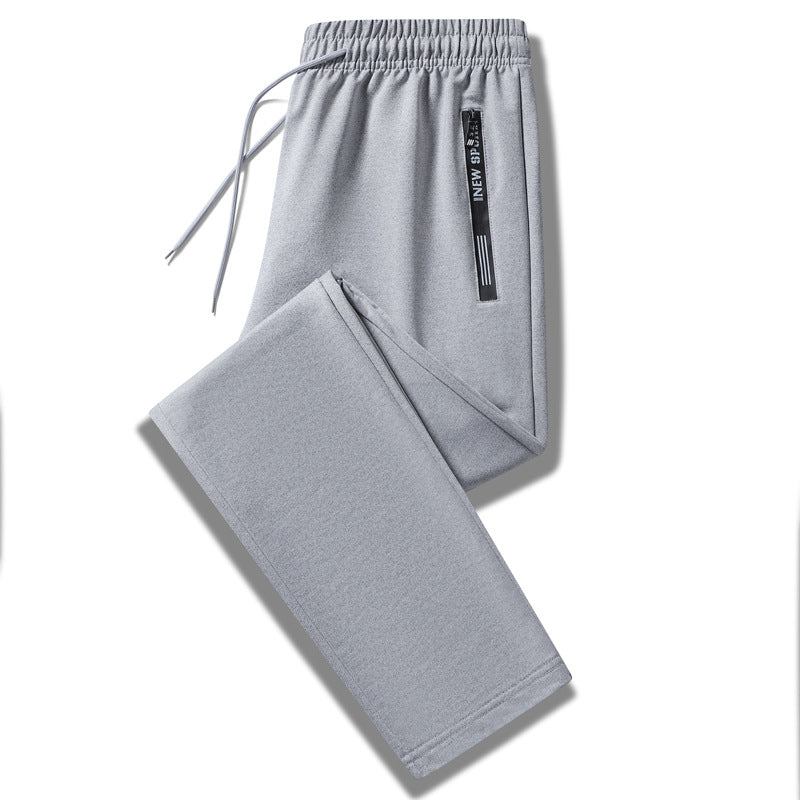 Herren Sportliche Trainingshose mit elastischem Tunnelzugbund, Reißverschlusstasche und glattem Performance‑Material Echo Archiv