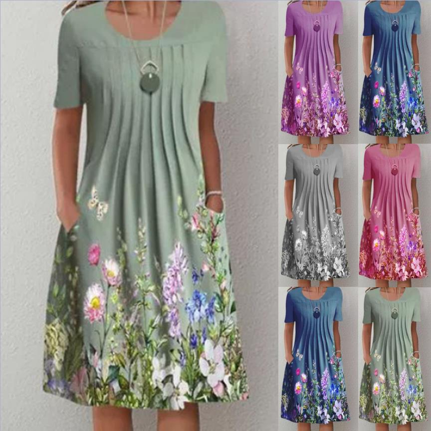 Damen Plissee Midi Kleid mit kurzen Ärmeln, seitlichen Taschen und floralem Saum – Élara