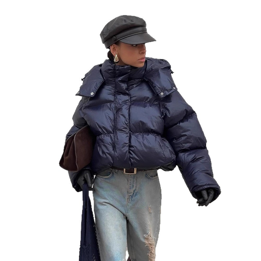 Damen Kurz geschnittene glänzende Oversize-Steppjacke mit hohem Kragen Echoarchiv