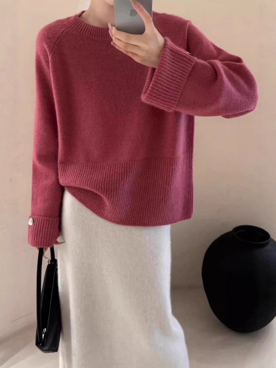 Damen Oversize-Rundhalspullover mit verlängerten Manschetten und Zierknopf Echoarchiv