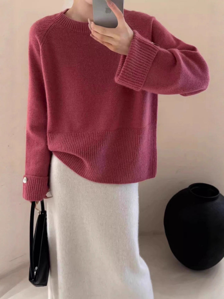 Damen Oversize-Rundhalspullover mit verlängerten Manschetten und Zierknopf Echoarchiv