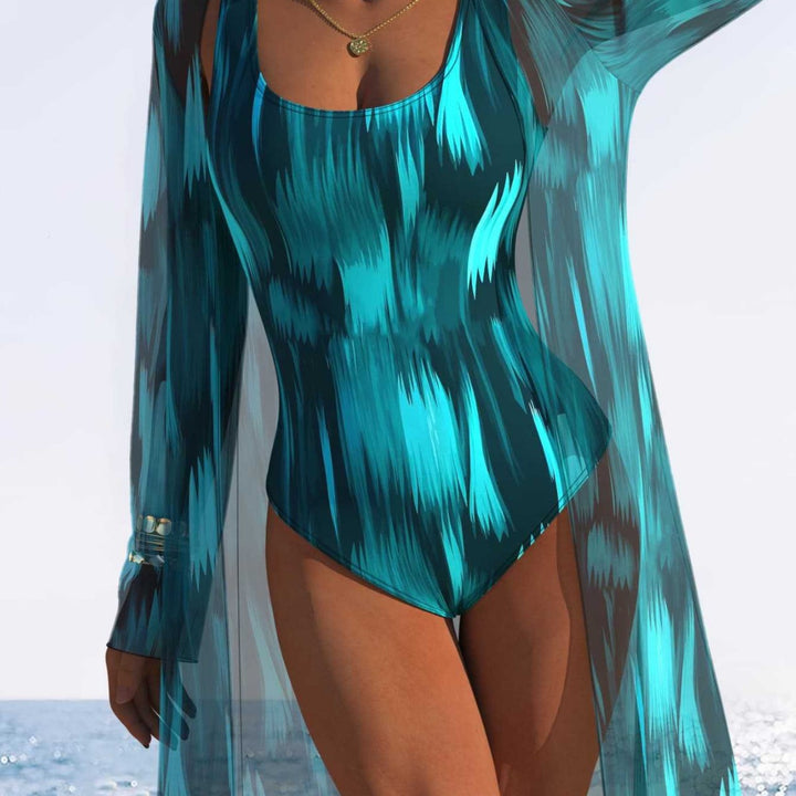 Damen Einteiliger Schwimmanzug mit transparentem Überwurf und modernem Wellenmuster Echo Archiv