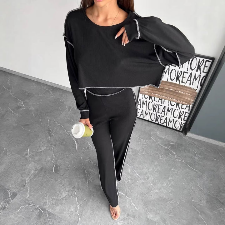 Damen Cropped Oversized-Sweatshirt mit Overlocknähten und High-Waist ausgestellter Hose Set – Avérine