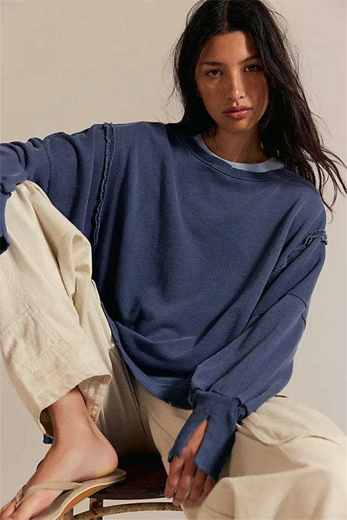 Damen oversized Sweatshirt mit Ballonärmeln, offenen Saumnähten und seitlichen Schlitzen – Avérine