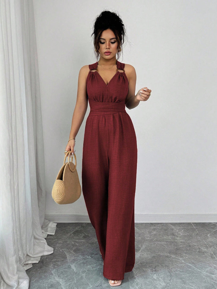 Damen Jumpsuit mit weitem Bein, tailliertem Wickelband und Ösen-Trägern Echo Archiv