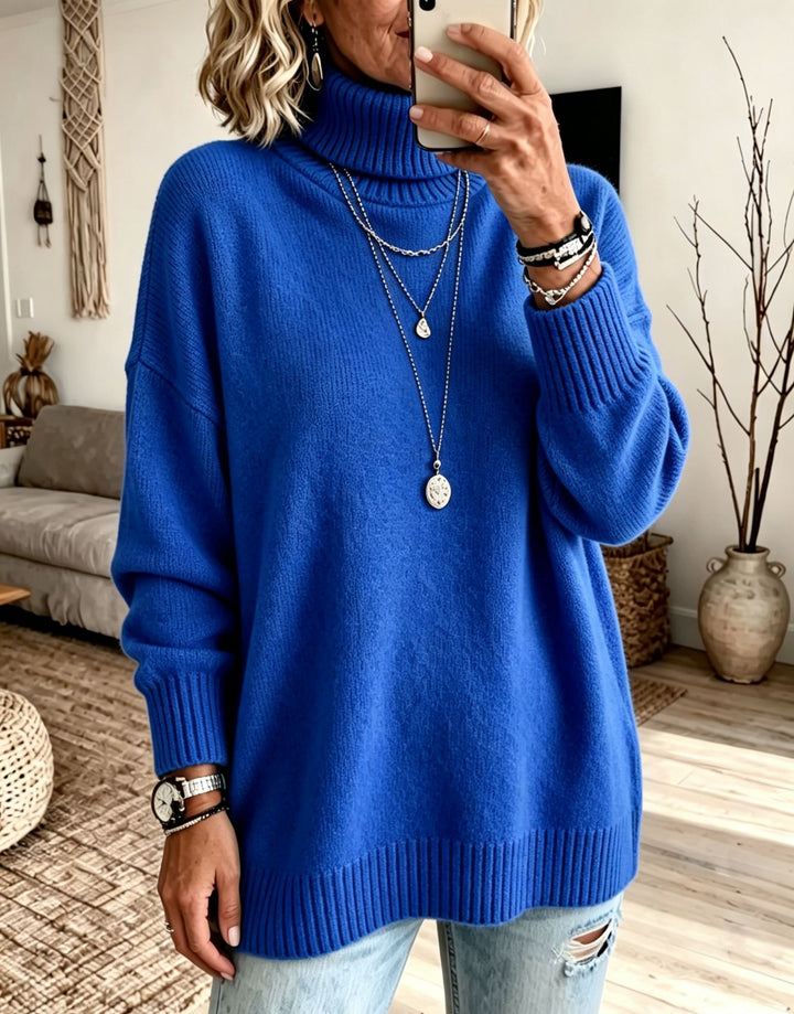 Damen Oversize Rollkragenpullover aus Feinstrick mit gerippten Bündchen und überschnittener Schulter – Mavelle