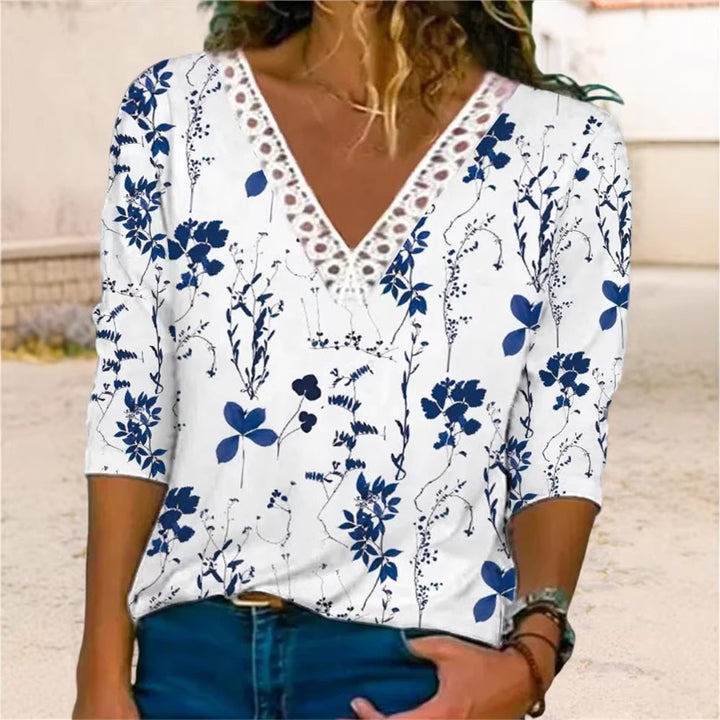 Damenbluse mit V-Ausschnitt und Spitzenbesatz, 3/4-Ärmel, Blumenmuster und lockerer Schnitt Echoarchiv