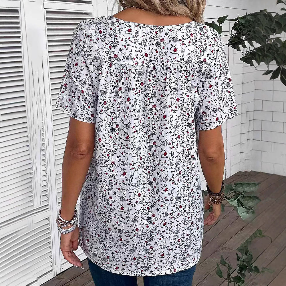 Damen nan lässiges Kurzarm-Tunika-Shirt mit Rundhalsausschnitt, zartem Blumenallover und dekorativen Brustfalten Echo Archiv
