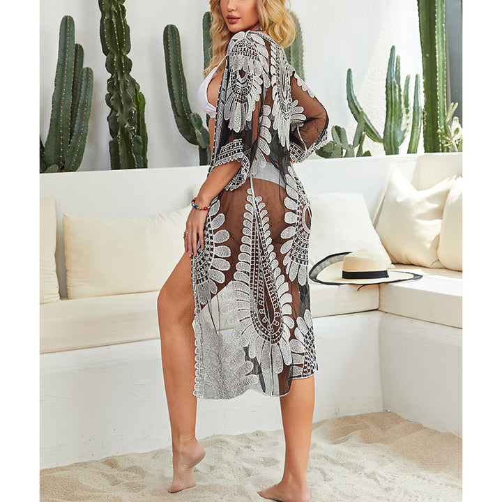 Damen Häkel-Strandüberwurf mit floralen Motiven und lockerem Schnitt Echo Archiv