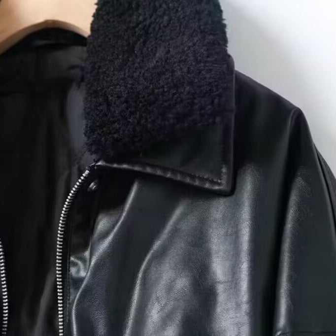 Damen Oversize Kunstlederfliegerjacke mit Teddykragen und Pattentaschen Echo Archiv