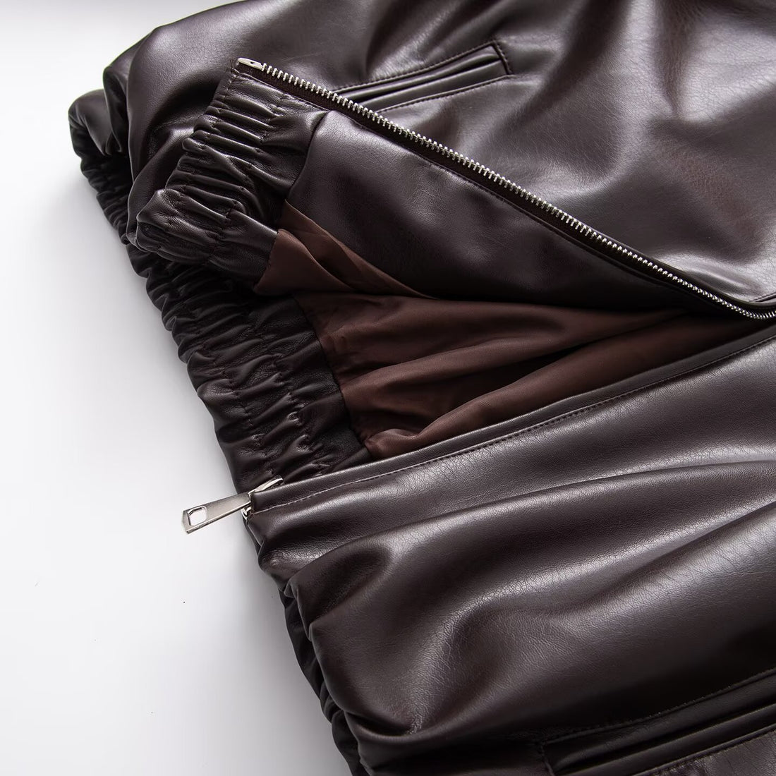 Damen Oversized Kunstleder-Blousonjacke mit Kragen, Reißverschluss und elastischem Saum Echoarchiv