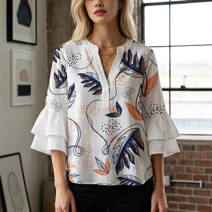 Damen Elegantes Oberteil mit voluminösen Rüchenärmeln und floralem Druck Echo Archiv