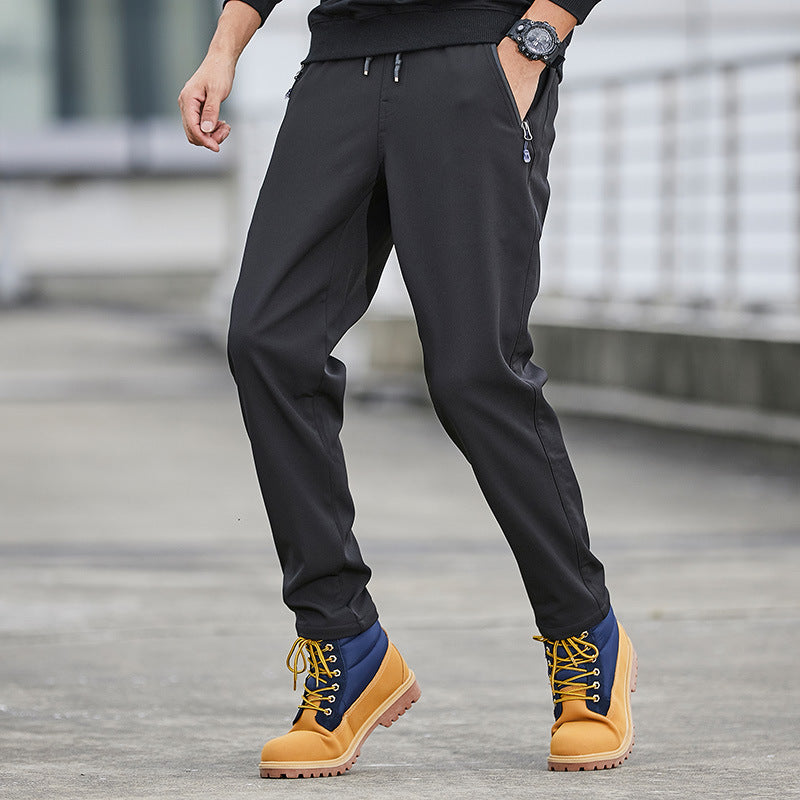 Herren Technische Softshell-Jogginghose mit wasserabweisender Membran, Reißverschlusstaschen und elastischem Kordelbund Echo Archiv