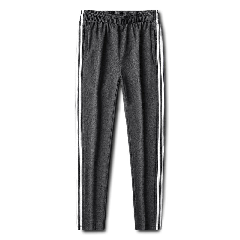 Herren Slim-Fit Trackhose mit seitlichen Kontraststreifen, Reißverschlusstaschen und elastischem Bund – Sorevano