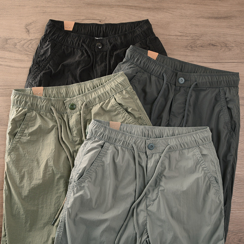 Herren lässige Jogginghose mit elastischem Bund und seitlichen Taschen Echoarchiv