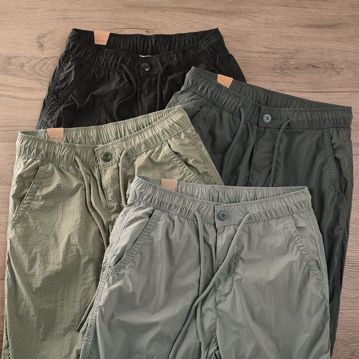 Herren lässige Jogginghose mit elastischem Bund und seitlichen Taschen Echoarchiv