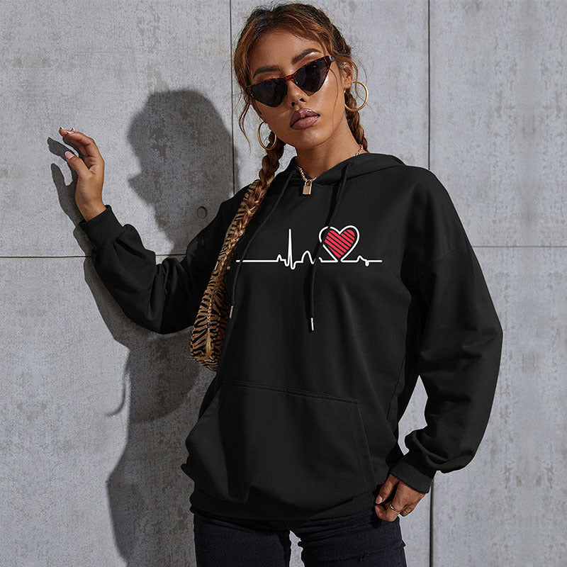 Damen Oversize-Kapuzenpullover mit Herz-EKG‑Print und Kängurutasche Echoarchiv