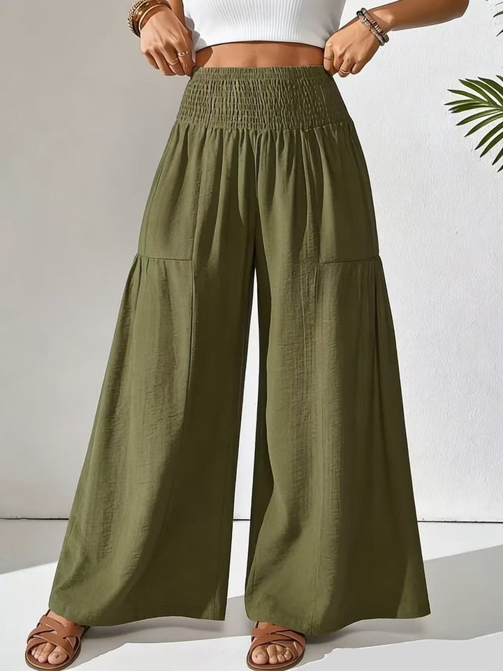 Damen weite Palazzo-Hose mit gerafftem Smock-Bund und Stufendetails – Avélisse