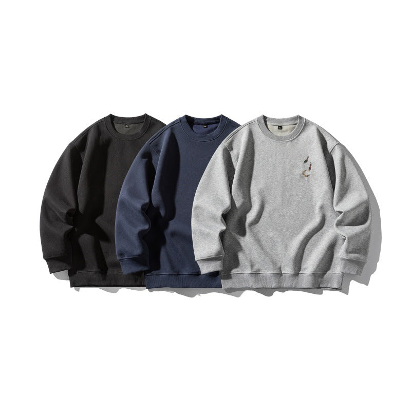 Unisex Oversize-Sweatshirt mit dezenter Koi-Stickerei Echoarchiv