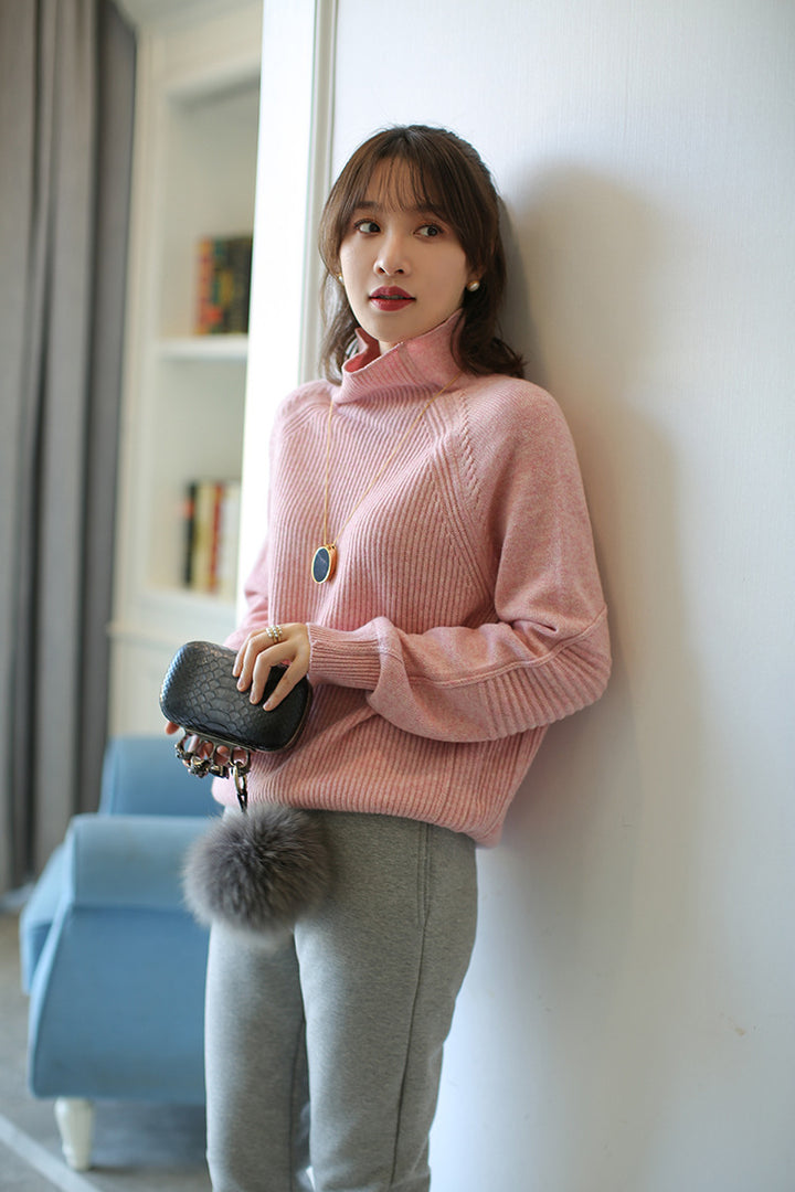 Damen Rollkragenpullover aus feinem Rippstrick mit Raglanärmeln und legerer Silhouette Echoarchiv