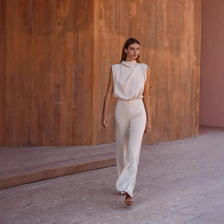 Damen Eleganter Jumpsuit mit hochgeschlossenem Kragen und weiten Beinen Echo Archiv