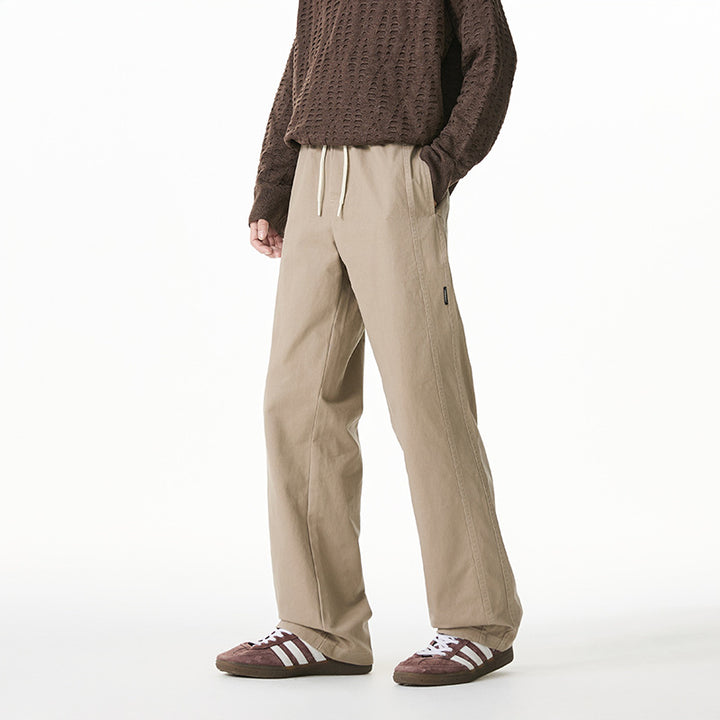 Herren Locker geschnittene Baumwoll-Canvas-Hose mit Tunnelzugbund, geradem Bein und Ziernaht-Details Echo Archiv