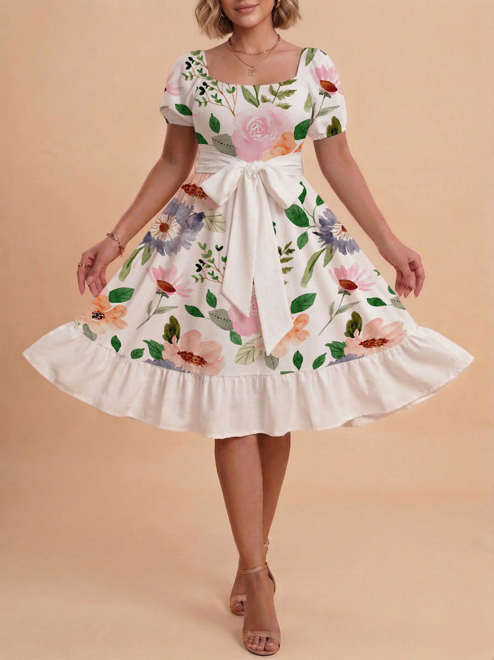 Damen Sommerliches Blumenkleid mit taillierbarem Gürtel und voluminösen Ärmeln Echo Archiv