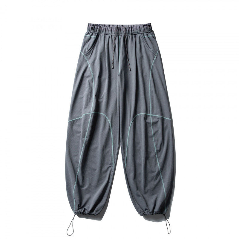 Unisex Locker geschnittene Tech-Jogginghose mit elastischem Bund, markanten Flatlock-Nähten und Kordelzug Echo Archiv
