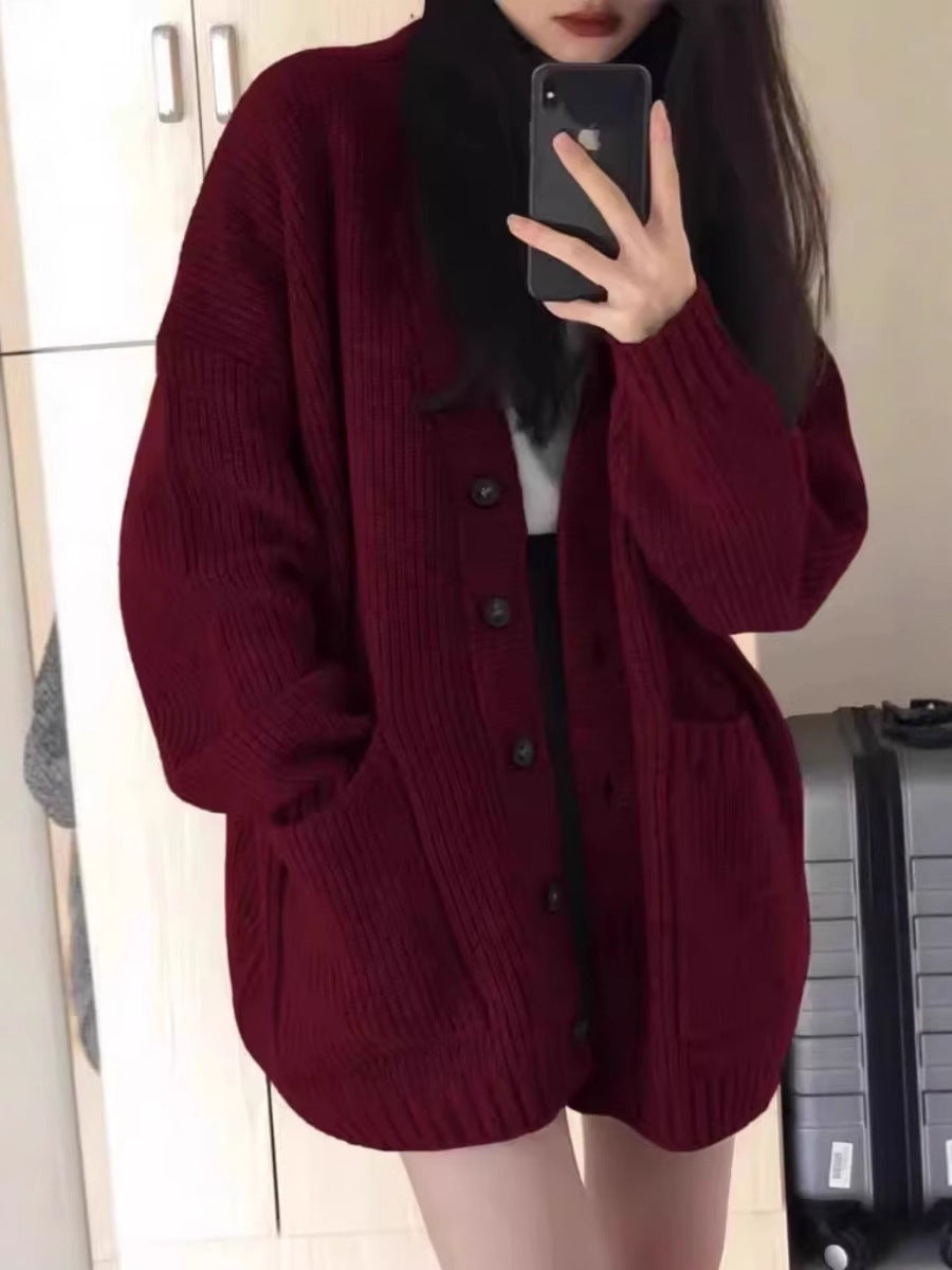 Damen Oversize Strickcardigan mit aufgesetzten Taschen und durchgehender Knopfleiste Echoarchiv