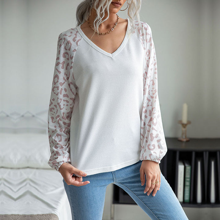Damen Feinstrick-V‑Neck-Shirt mit Waffelstruktur und Chiffon-Leopardenärmeln Echoarchiv