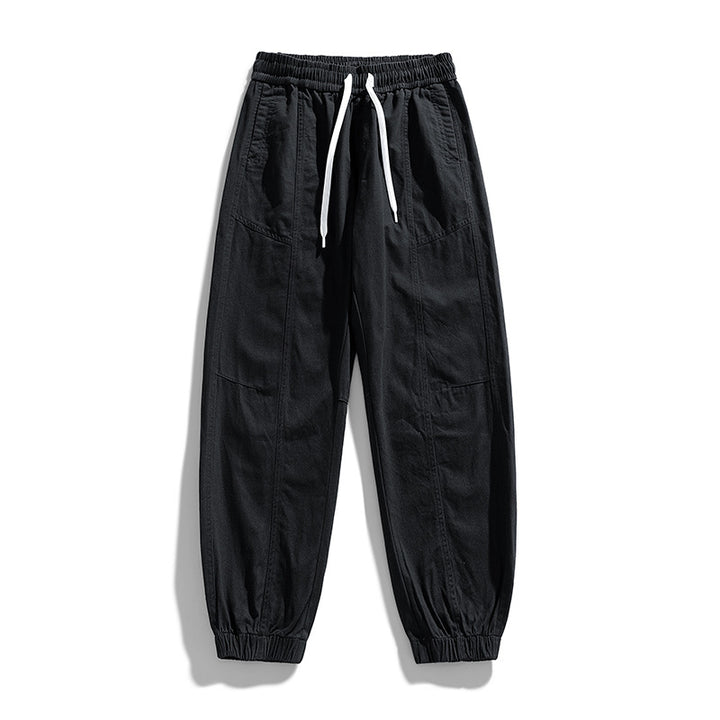 Herren Oversized Utility-Jogginghose aus robustem Baumwollmix mit Kordelbund, seitlichen Cargo‑Taschen & gerippten Bündchen Echoarchiv