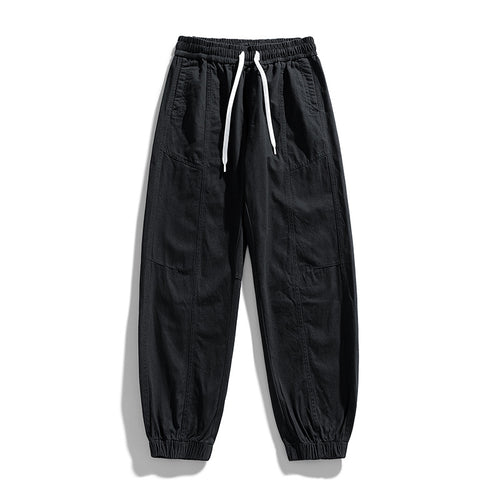 Herren Oversized Utility-Jogginghose aus robustem Baumwollmix mit Kordelbund, seitlichen Cargo‑Taschen & gerippten Bündchen Echoarchiv