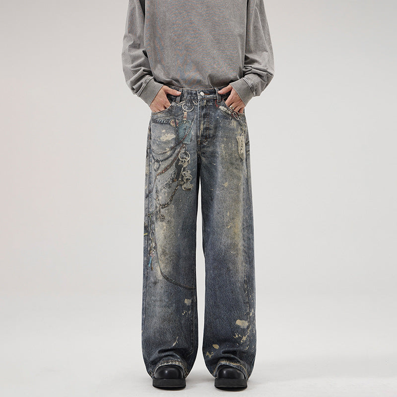 Herren Weit geschnittene Stonewashed-Denim-Jeans mit Kettenprint, Farb‑Splatter und bodenlangem Saum Echo Archiv