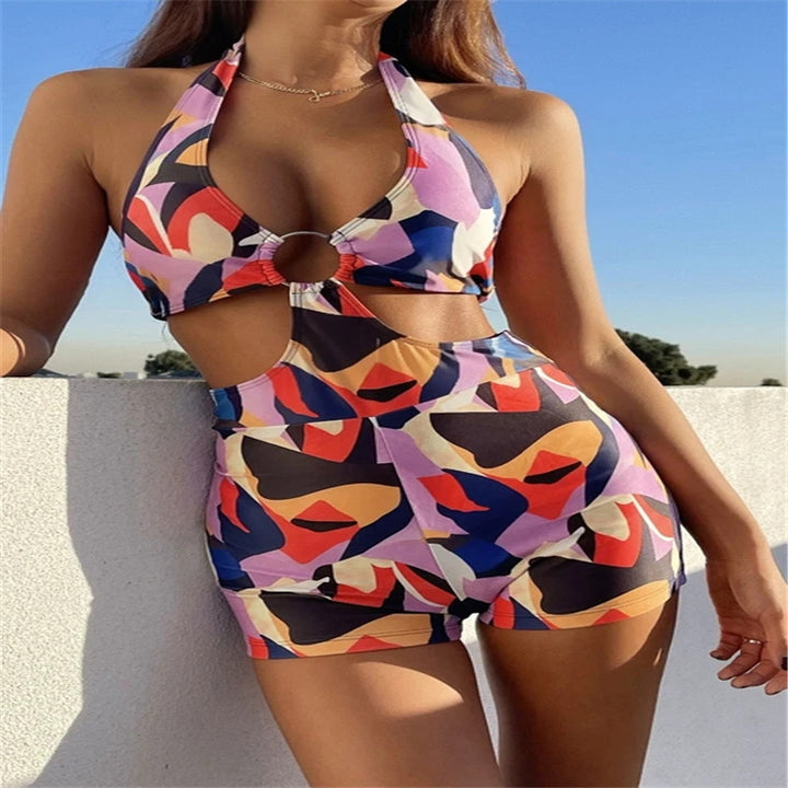 Damen Badeanzug mit hohem Beinausschnitt und raffiniertem Cut-Out Echo Archiv