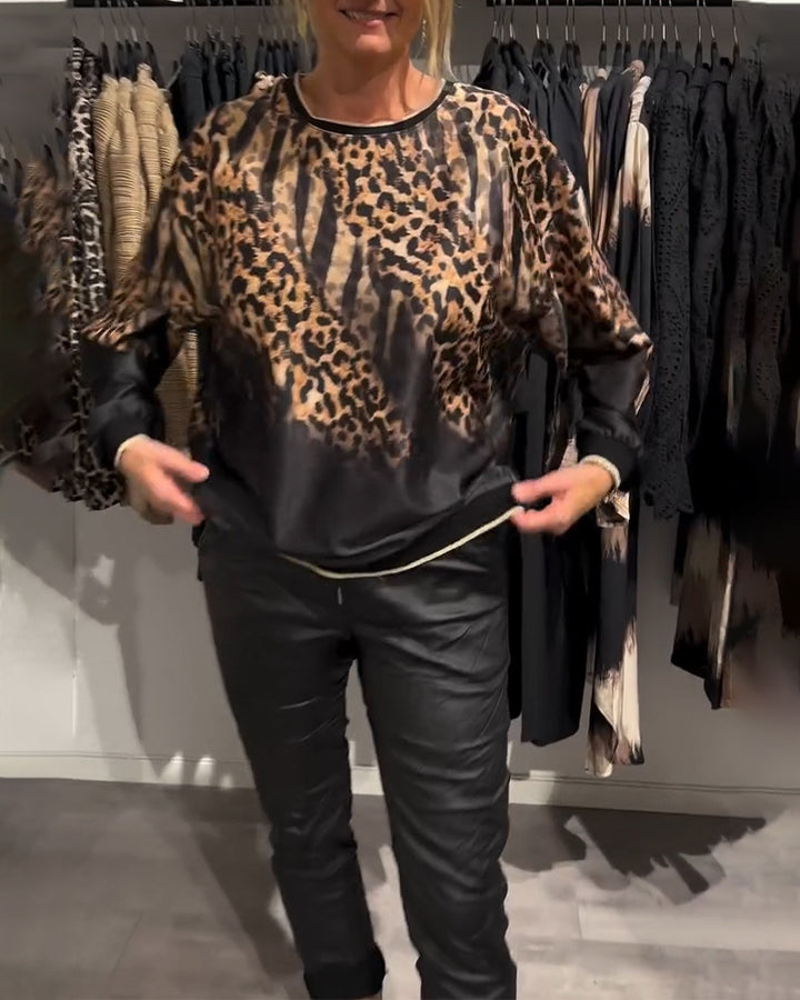 Damen nan seidige Oversize-Bluse mit Animalmuster, Raglanärmeln und elastischem Saum Echo Archiv