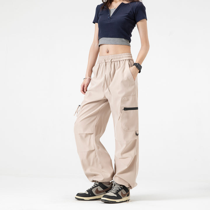 Damen Weite Cargo‑Schlaghose mit hohem Elastbund, Multitaschen und verstellbarem Saum Echo Archiv