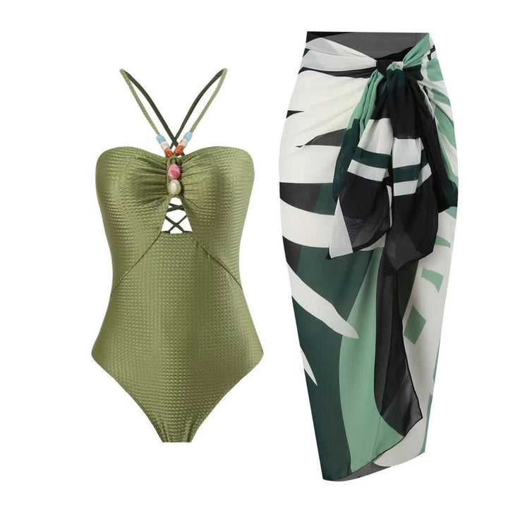 Damen Badeanzug mit trendigem Cut-Out und elegantem Wickelrock Echo Archiv