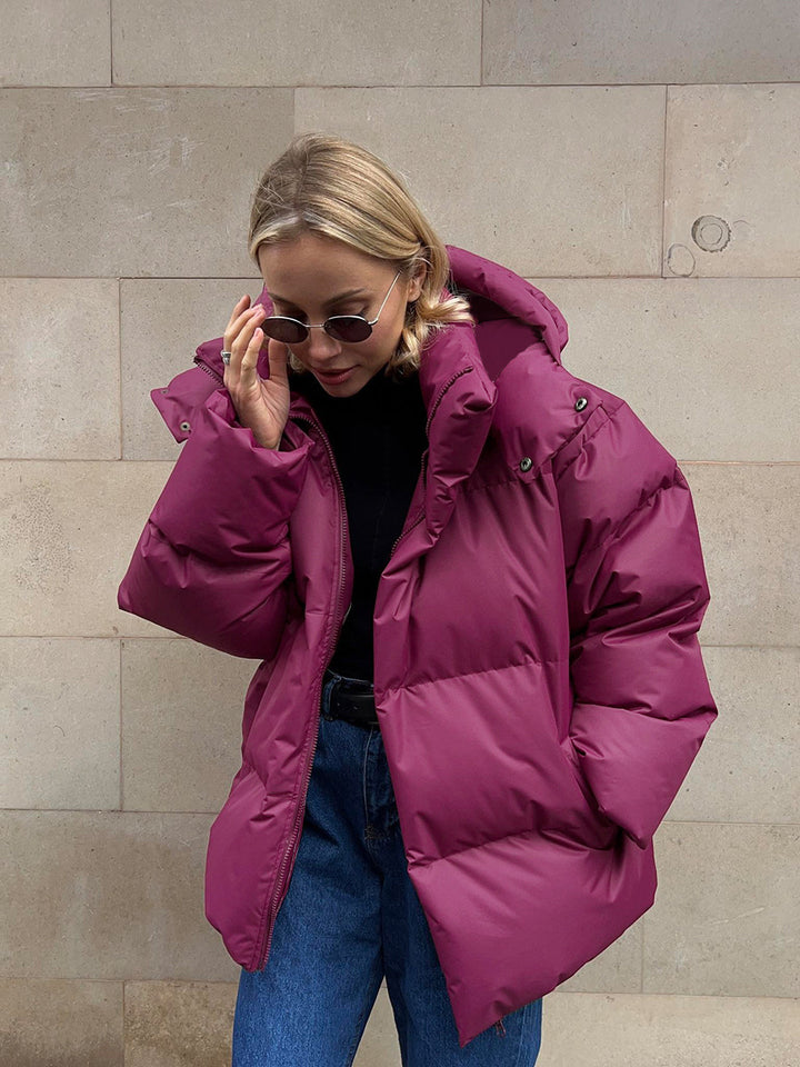 Damen Oversize Steppjacke mit Kapuze und wattierter Thermofüllung Echoarchiv