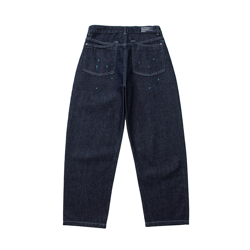 Herren Relaxed-Tapered Denimhose mit Farbklecks-Detail und hohem Bund Echoarchiv