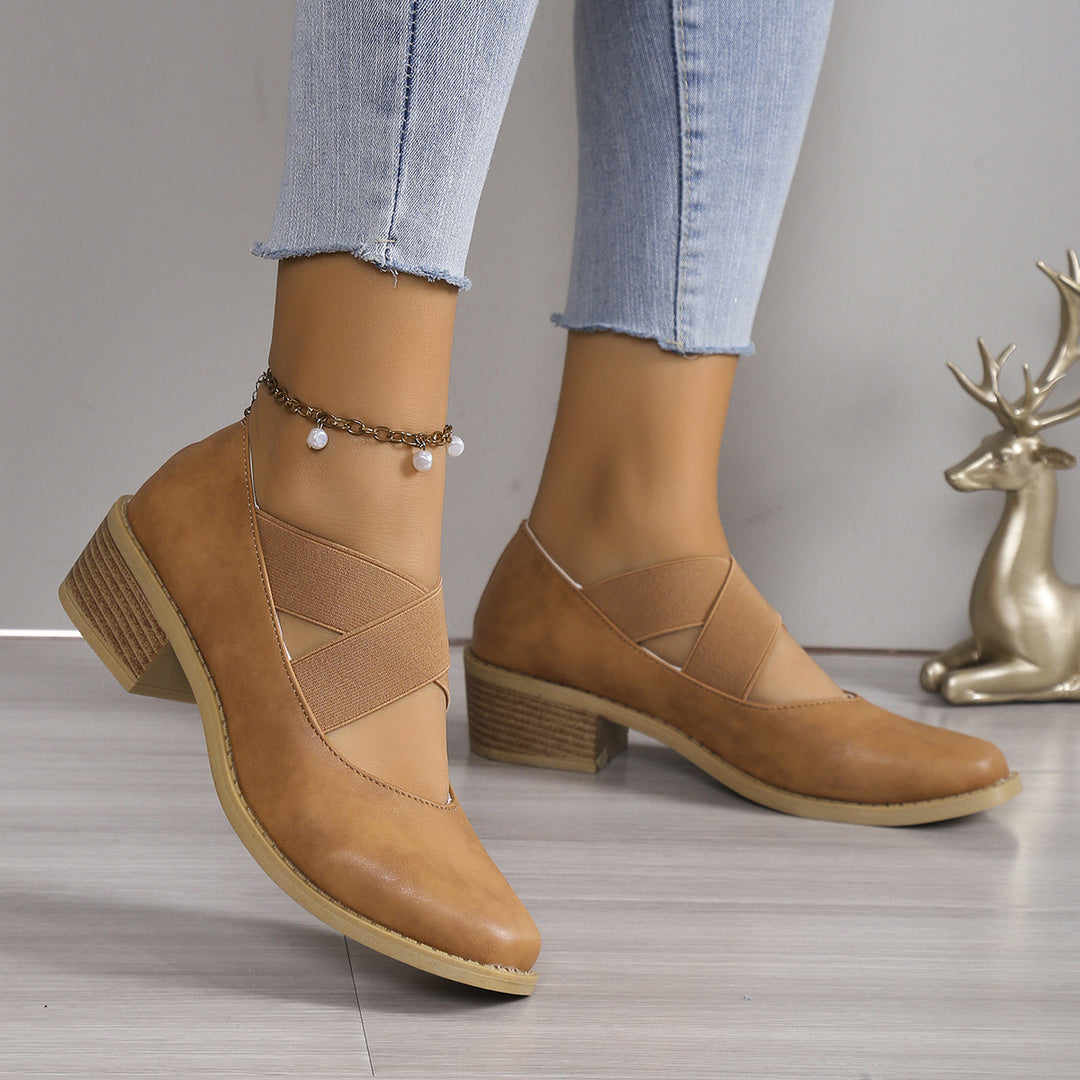 Damen Slipper-Pumps mit kreuzenden Elastikriemen und Blockabsatz Echoarchiv