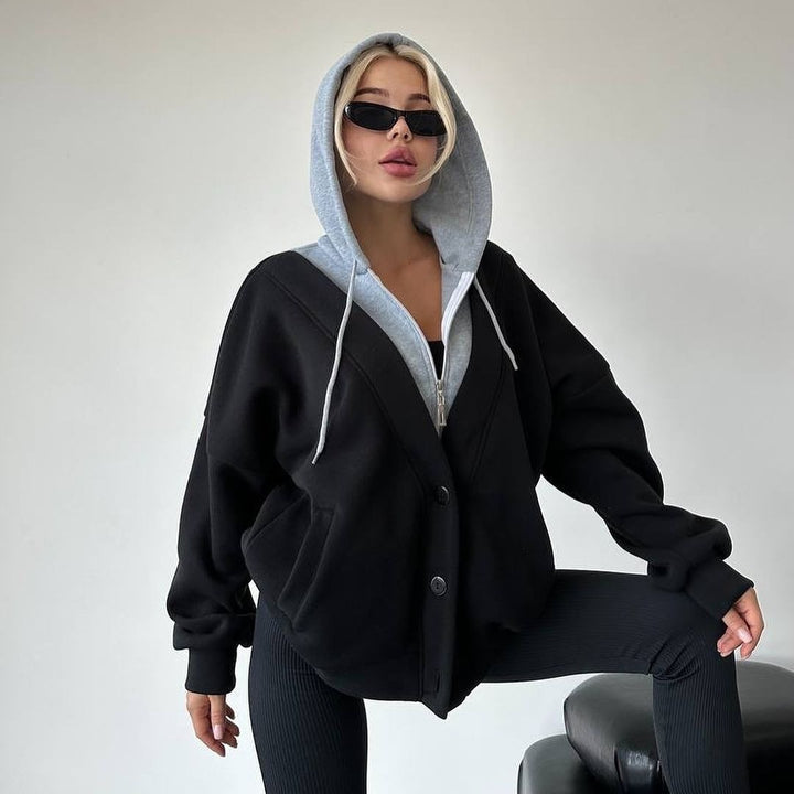 Damen Oversized Kapuzenjacke mit Druckknopfverschluss und Eingrifftaschen Echoarchiv