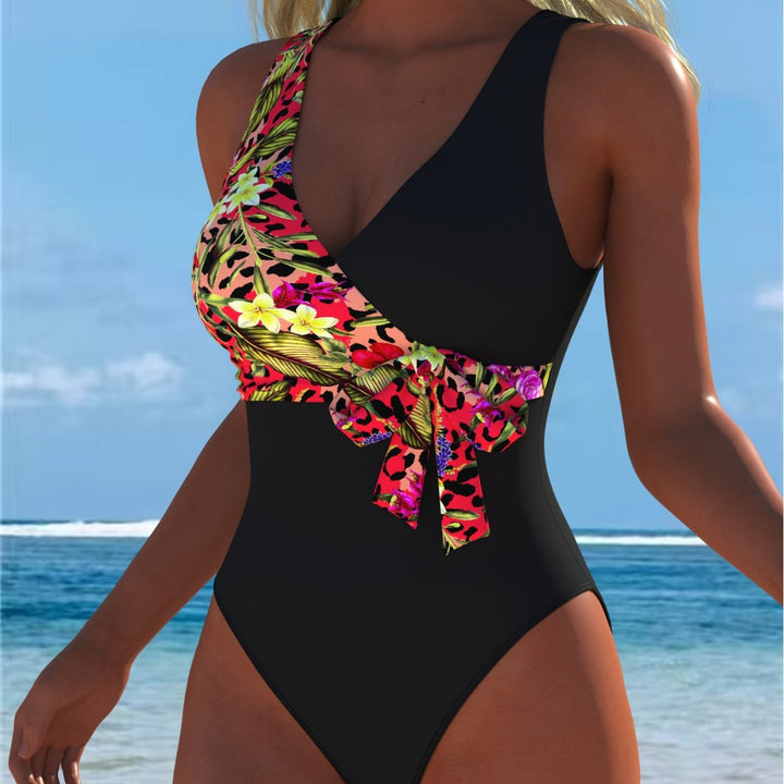 Damen einteiliger Badeanzug mit floralem Wickeldesign und modischem Schwarz Echo Archiv