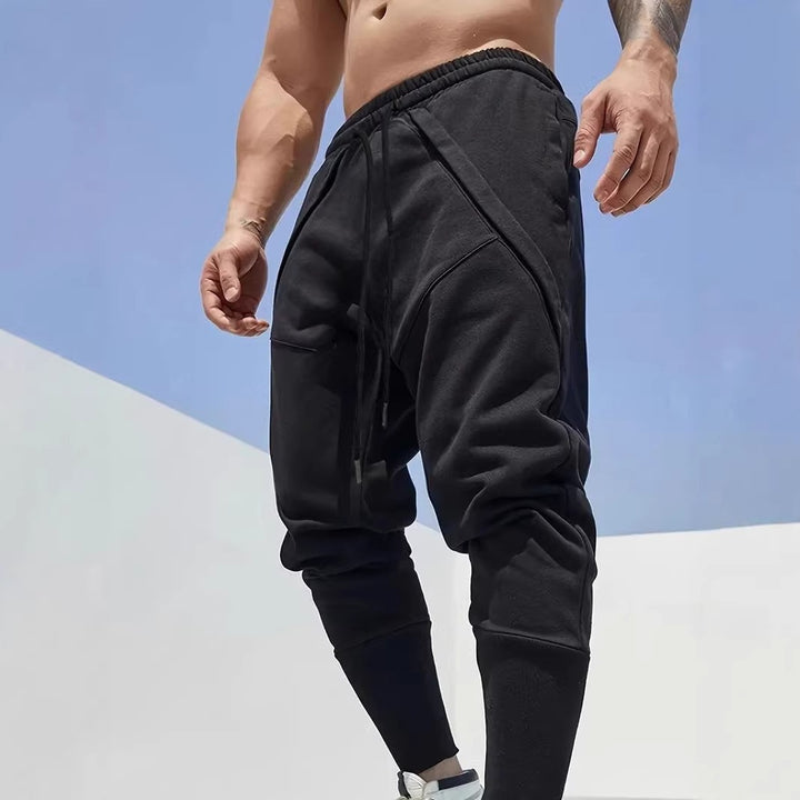 Herren Tapered-Jogginghose mit tiefem Schritt, elastischem Bund & diagonalgesetzten Taschen Echo Archiv