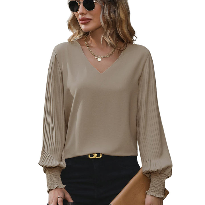 Damen Feminine V-Ausschnitt-Bluse mit plissierten Ballonärmeln und Smokmanschetten Echoarchiv