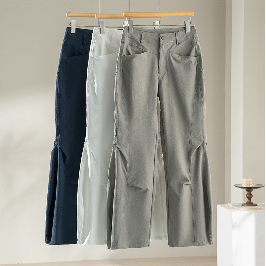 Damen Weite High‑Waist-Hose mit eingesetztem Beinschlitz und markanten Eingrifftaschen Echoarchiv