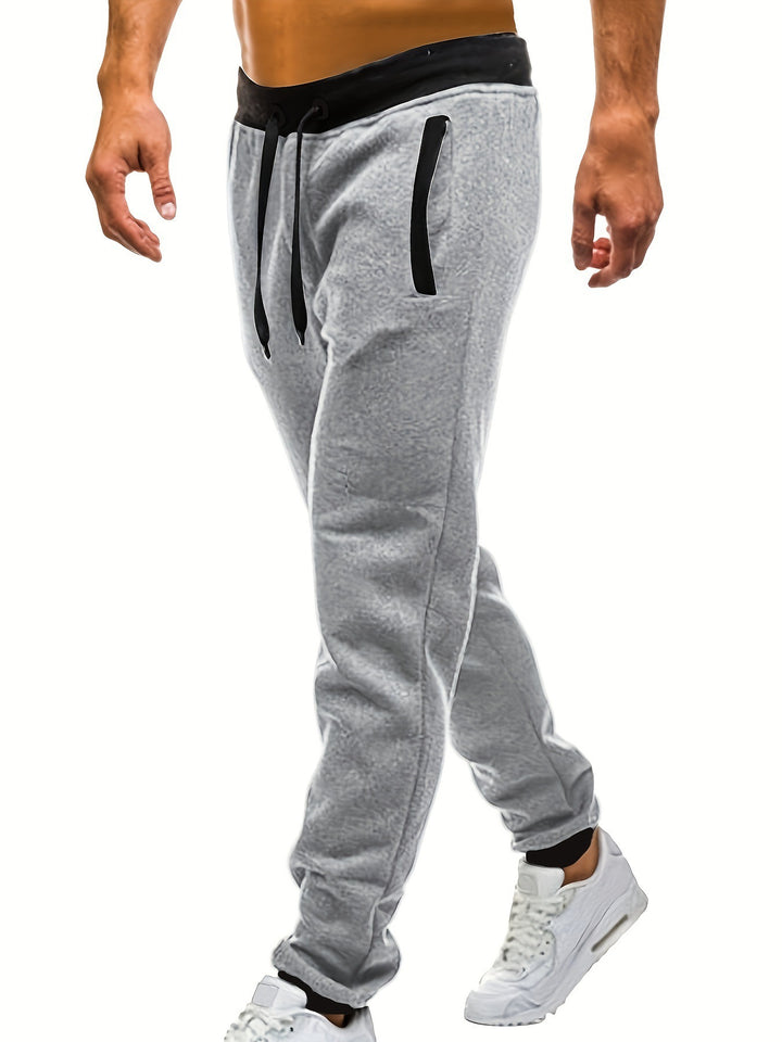 Herren Sportliche Sweatpants mit elastischem Bund und seitlichen Taschen Echoarchiv
