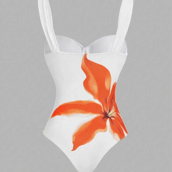 Damen Badeanzug mit elegantem floralem Design und passendem Wickelrock Echo Archiv