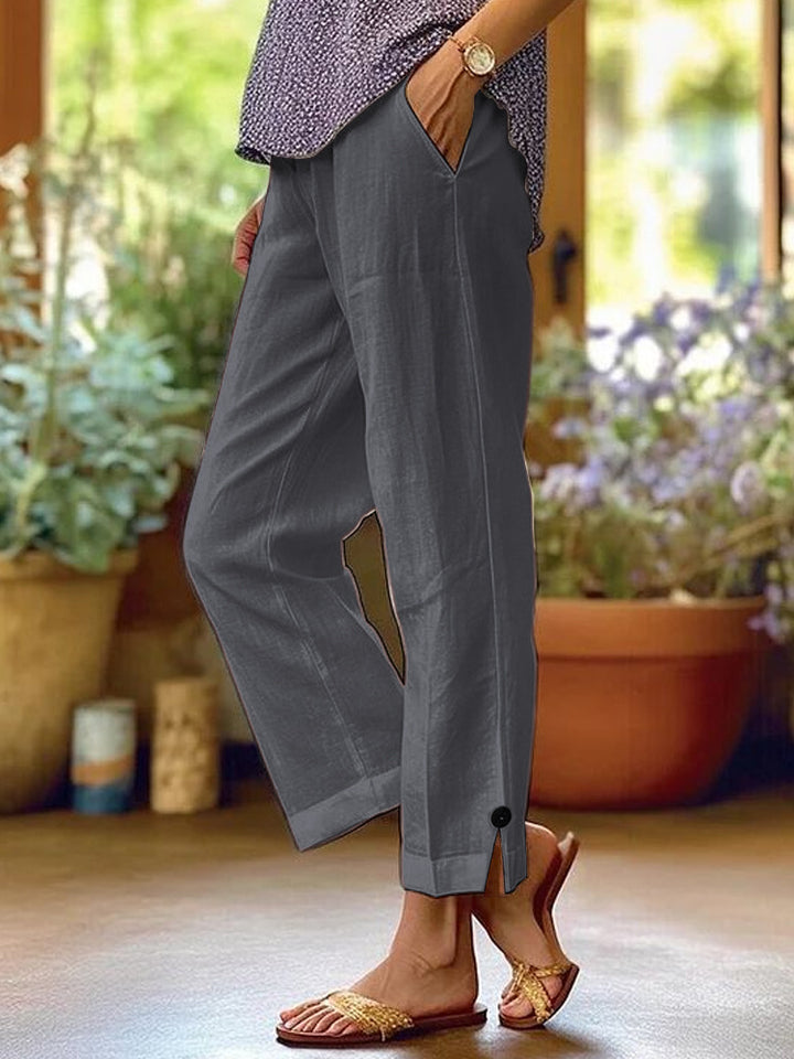 Damen Leinenhose mit lockerer, knöchellanger Passform, seitlichen Eingrifftaschen und Zierknopf-Details – Avélisse