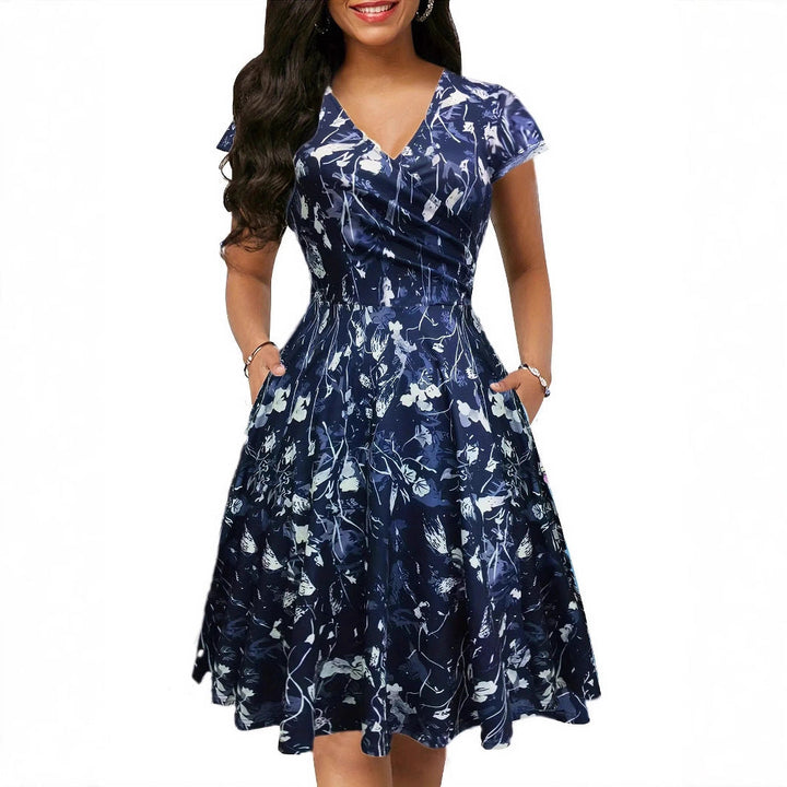 Damen Blumenkleid mit V-Ausschnitt und Taschen Echoarchiv