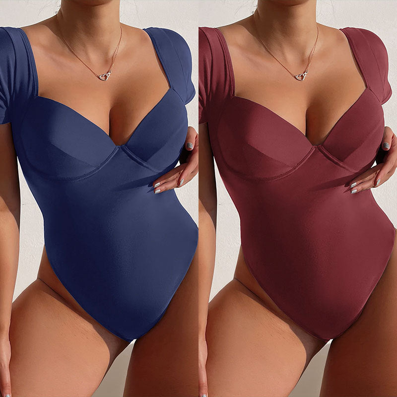 Damen Einteiler Badeanzug mit eleganten Trägern und sculpturalem V-Ausschnitt Echo Archiv